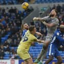 Cardiff City’s Rubin Colwill clears the danger as Emil Riis puts him under pressure (photo: Ian Cook /CameraSport)