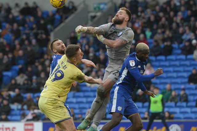 Cardiff City’s Rubin Colwill clears the danger as Emil Riis puts him under pressure (photo: Ian Cook /CameraSport)
