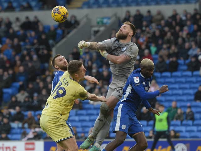 Cardiff City’s Rubin Colwill clears the danger as Emil Riis puts him under pressure (photo: Ian Cook /CameraSport)