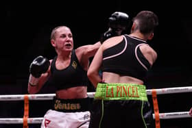 Lisa Whitesid, left, lands a punch on Eva Cantos in a previous encounter (Photo by George Wood/Getty Images)