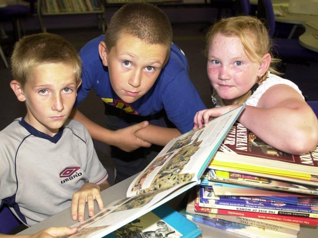 Learning at Ribbleton Hall High summer school (from left to right) James Harrison, 11, Antony Parker, 11, and Chelsea Moram, 11, pictured in 2003
