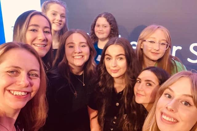 Cath Hill with members of the choir involved in the Bee The Difference project.