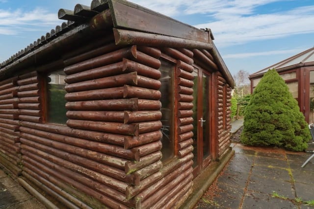There is a double garage with a second floor.