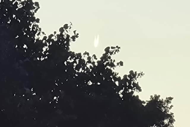 The fireball appeared fainter to the naked eye. This picture was taken by Farida Ban before she used her camera phone to zoom in x10 for a closer look (See image above)