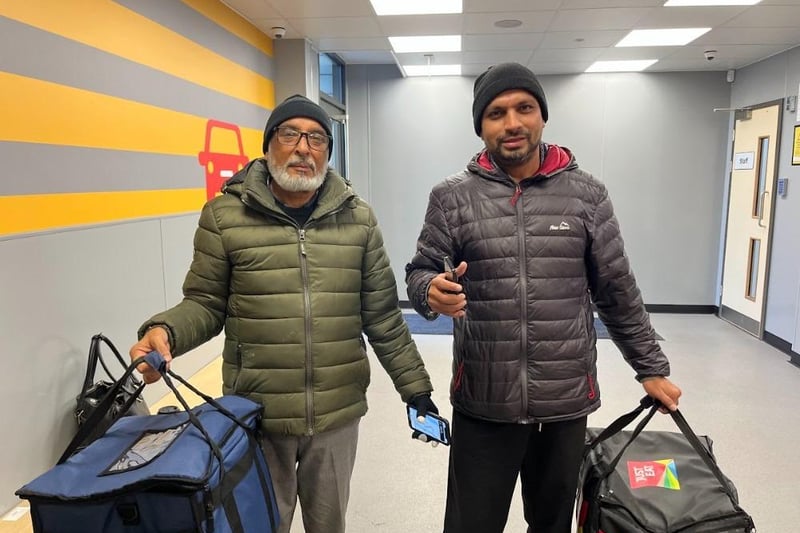 Delivery drivers Akbar Ali (left) and Imran Paptel (right) inside the main reception