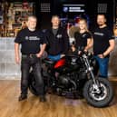 Bowker Motorrad staff  with the Ian Fletcher and the customised bike at the Waterloo Bar