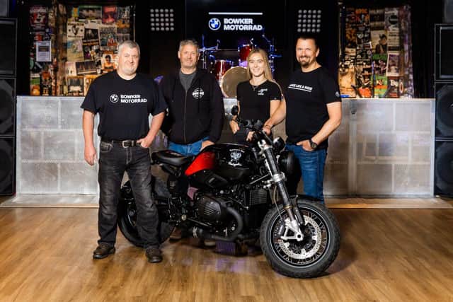 Bowker Motorrad staff  with the Ian Fletcher and the customised bike at the Waterloo Bar