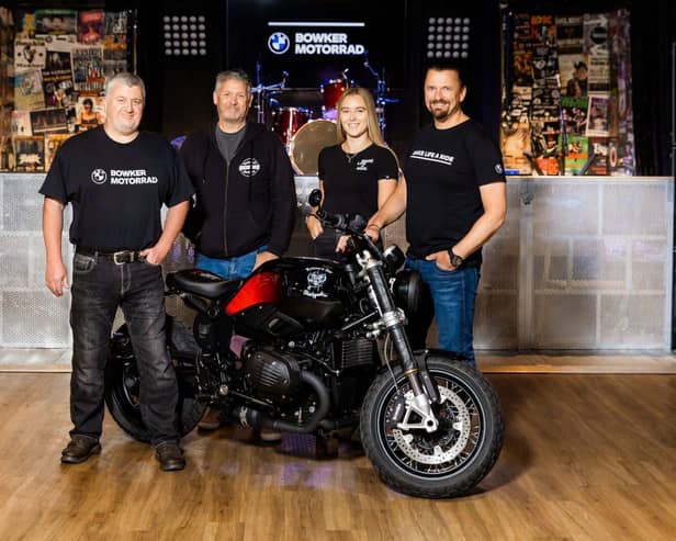 Bowker Motorrad staff  with the Ian Fletcher and the customised bike at the Waterloo Bar