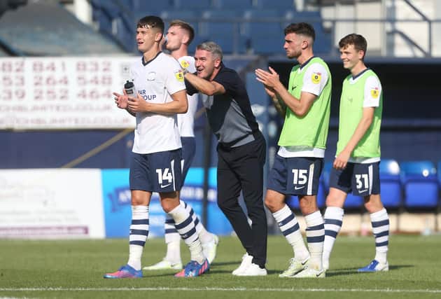 Preston North End manager Ryan Lowe celebrates at the end of the match with Jordan Storey after a clean sheet and win at Luton Town.