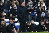 Morecambe manager Derek Adams shouts instructions to the players from the touchline at Stamford Bridge (Photo by BEN STANSALL/AFP via Getty Images)