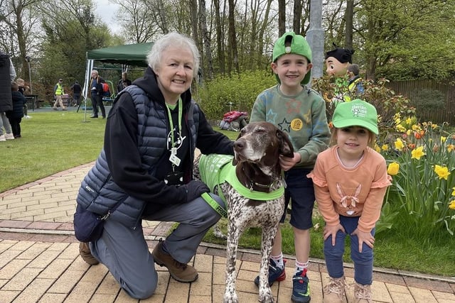 Oscar and Ada Burrow with Shuna the therapy dog and her owner Linda.