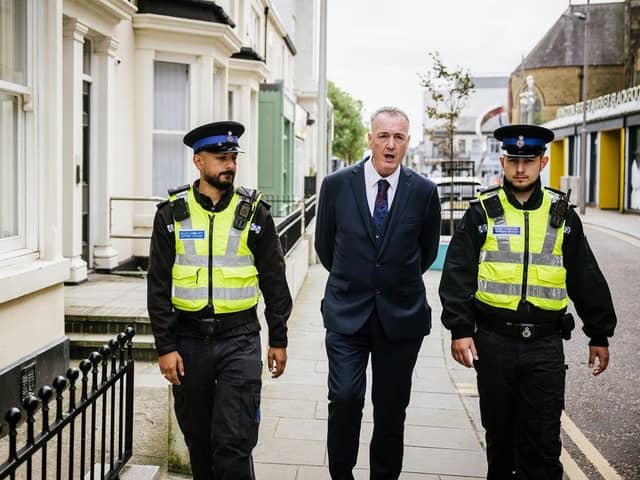 Lancashire PCC Clive Grunshaw with officers.
