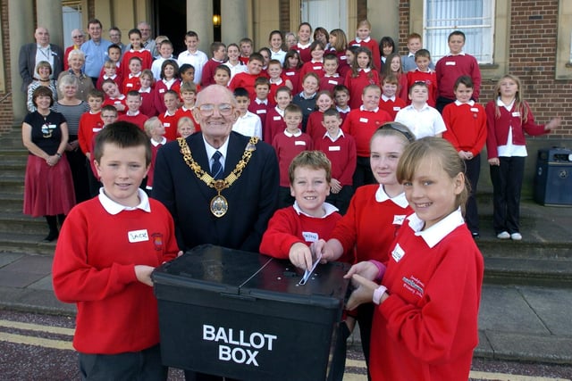 The mayor Coun Roger Sherlock, local councillors and organisers, with pupils from Morecambe Bay Primary School and Sandylands Primary School, who were guests at Morecambe Town Hall where they held a mock election and mock council meeting