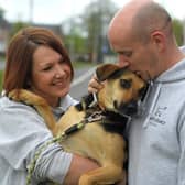 Buckshaw Village couple Phill and Nikki Berry with their Romanian rescue dog Maia.