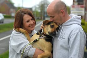 Buckshaw Village couple Phill and Nikki Berry with their Romanian rescue dog Maia.