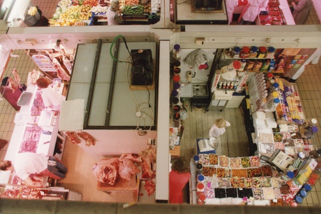 Sweets on one side, meat on the other... a classic view of just two of the stalls found at Preston's Indoor Market