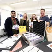 UCLan students recieving bursaries from Forepoint's Keith Noble and Abi Stones