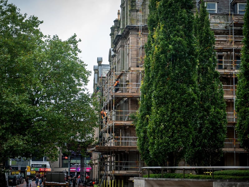 Workmen erecting scaffolding on the former Post Office building in Preston City Centre