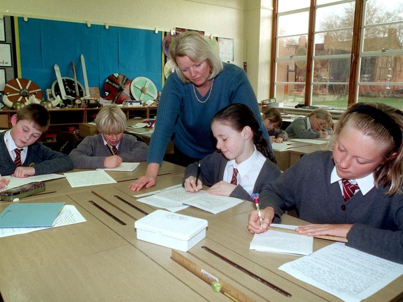 Yvonne Gorton checks over pupils work at Farington County Primary school, Farington, Leyland, where she currently runs the after school club and is hoping to run a homework club