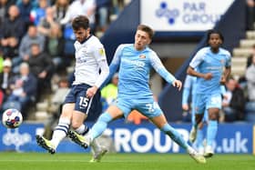 Preston North End's Troy Parrott battles with Sunderland's Dan Neil