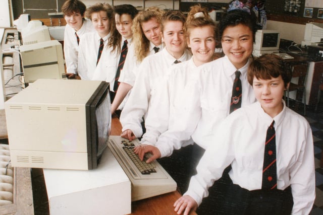 A Lancashire high school has distinguished itself in a national hi-tech competition. Tulketh High School, Preston, entered 12 fifth-formers for the Royal Society of Arts exam on computing and word processing. Not only did all 12 pass, but they received distinctions. Pictured are some of the pupils who gained distinctions in their word processing exams