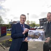 UCLan's Professor Graham Baldwin and Morgan Sindall's Richard Potts. They are holding up a picture of the planned new building in front of the current building.