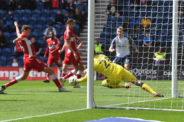 Preston North End striker Emil Riis' shot is deflected into the net off a Middlesbrough player