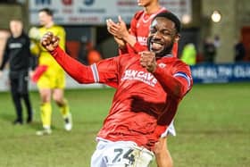 Morecambe skipper Yann Songo'o celebrates Tuesday's win against AFC Wimbledon Picture: Morecambe FC
