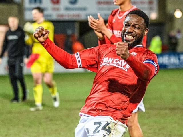 Morecambe skipper Yann Songo'o celebrates Tuesday's win against AFC Wimbledon Picture: Morecambe FC