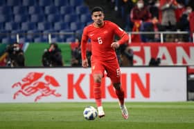 Tyias Browning, now Jiang Guangtai, of China in action during the FIFA World Cup Asian Qualifier Final between Japan and China