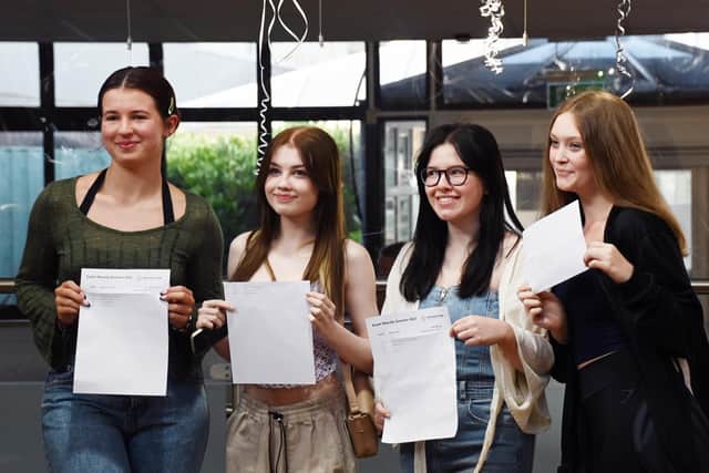 A-LEVEL RESULTS DAY 2023 - Students at Winstanley College, Orrell, Wigan, with their results.