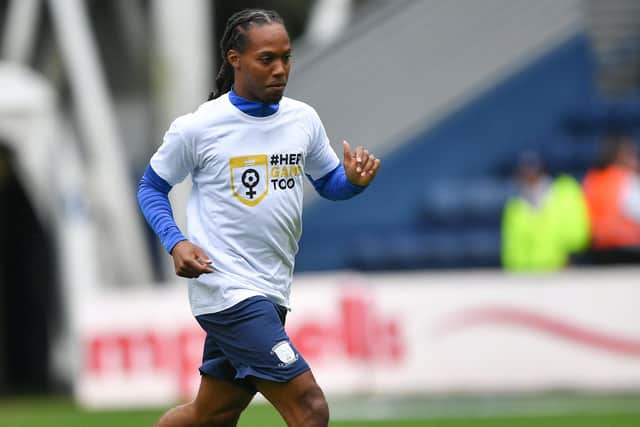 Preston North End's Daniel Johnson warms up in a Her Game Too t-shirt.