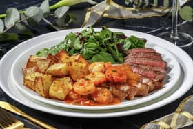 Fillet Steak Surf and Turf with Tomato-Garlic Prawns, Herby Roast Potatoes and Salad.