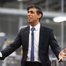 Rishi Sunak talks to local business leaders during a visit to a Coca-Cola factory in Lisburn, Northern Ireland yesterday (Picture: Liam McBurney/WPA pool/Getty Images)