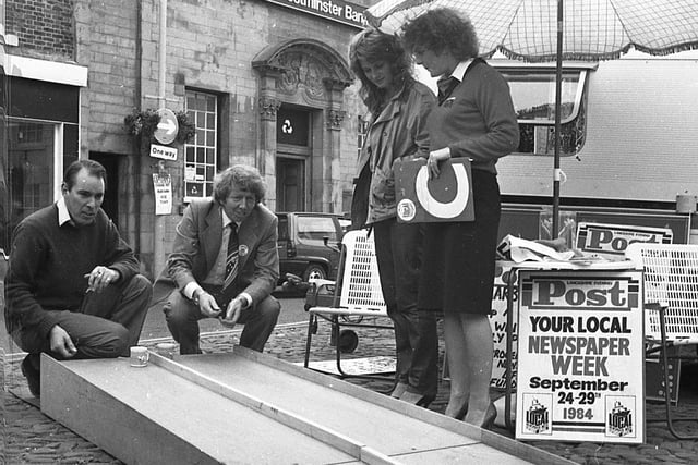 South Ribble MP Robert Atkins, a resident of Garstang, took time off shopping to challenge Evening Post managing director Mike West to a game of marbles when the Post Roadshow parked up on Garstang's High Street