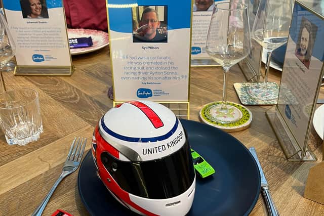 Kay has chosen to remember her brother by displaying a model racing car at his dedicated seat at the dining table.