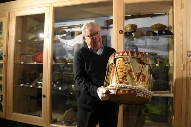 Volunteer Roy Skilbeck with just one of hundreds of military treasures when the Lancashire Infantry Museum at Fulwood celebrated its 90yj anniversary in 2020.