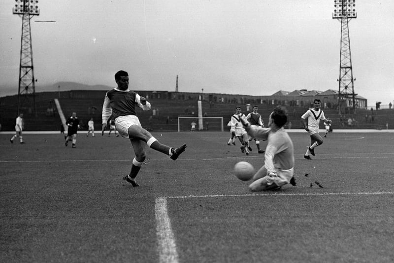 Jim Scott has a shot saved against Airdrie in a League Cup group game in August 1964. Hibs won 5-0.