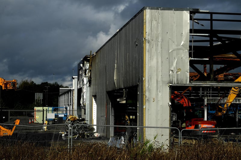 17 pictures as fire-damaged showroom demolished at Jaguar Land Rover ...