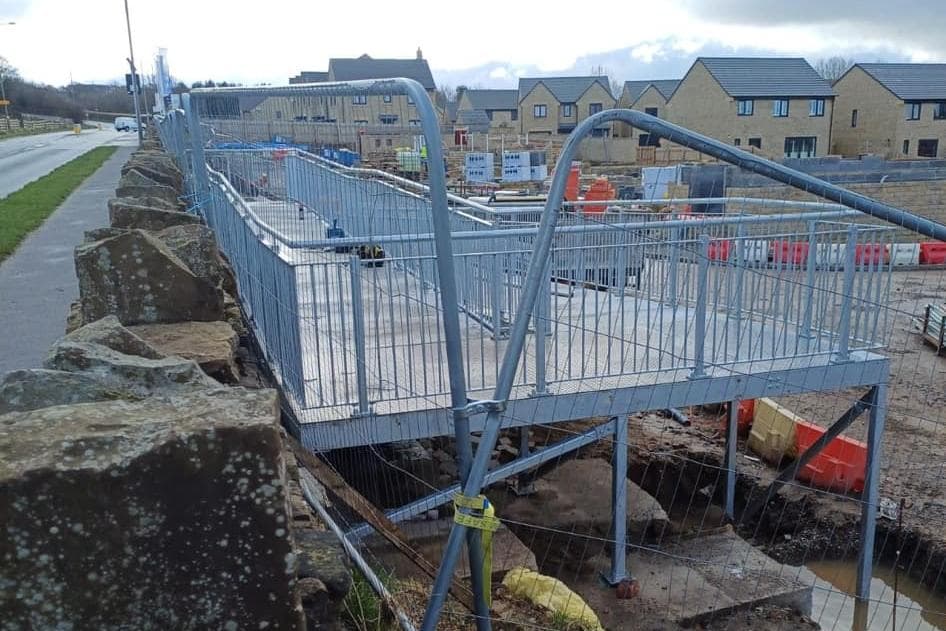 Furious residents slate 'monstrosity' of a walkway at entrance to luxury housing development in Burnley 