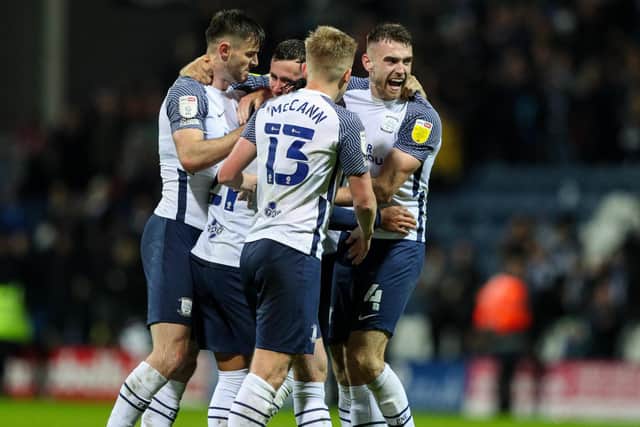 Preston North End's Ben Whiteman, Ali McCann, Andrew Hughes and Alan Browne celebrate at the final whistle against Blackpool