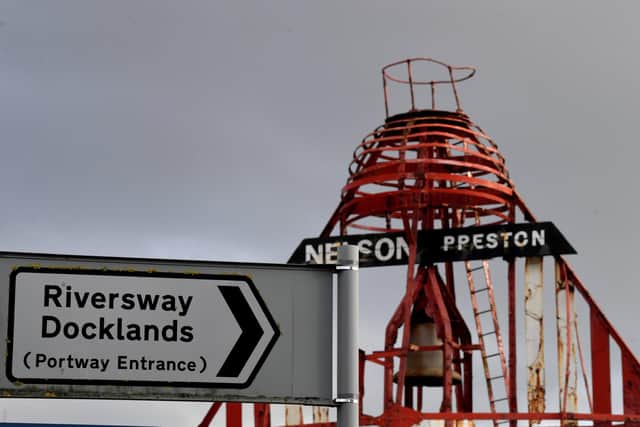Photo Neil Cross; The Nelson red â€˜bell-boatâ€™ buoy at the entrance to Preston Docklands