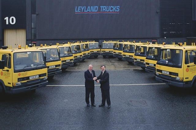 Mr Tony Hindle, general manager of Lancashire County Engineering Services, being presented by Keith Howard, engineering director of Leyland Trucks, with the keys for one of the fleet of twelve Leyland built 45 series, supplied by Lancashire Leyland DAF in 1997 Photo: Archive
