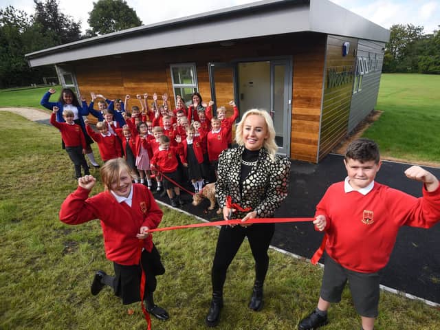 Liv Cooke returns to her former school, Woodlea Junior's, to open their new building