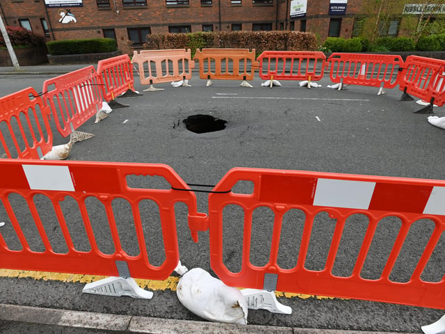 National Highways are concerned that the hole may increase in size and pose a danger to road users and pedestrians and so for everyone's safety, police have shut the road.
