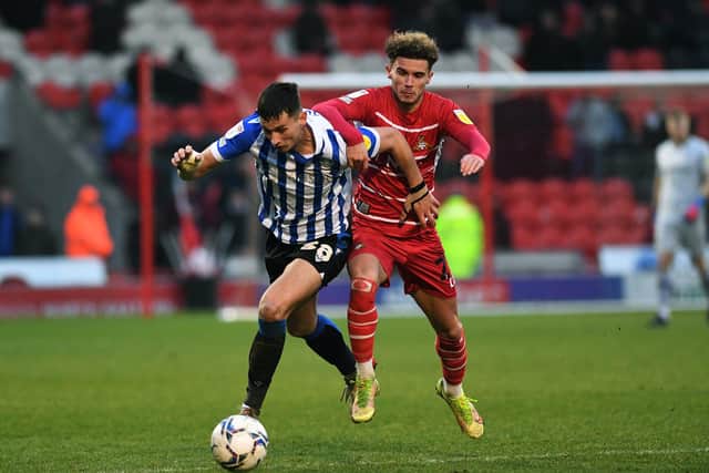 Preston North End defender Jordan Storey in action for loan club Sheffield Wednesday against Doncaster Rovers