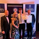 Sam Farnworth receiving his award
