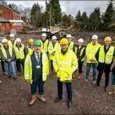 Work gets underway: Front of photograph are Coun Graham Gooch and Together's Alex Bodie.