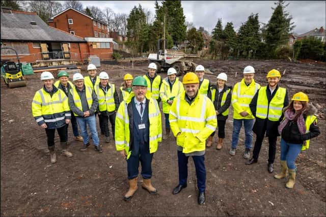 Work gets underway: Front of photograph are Coun Graham Gooch and Together's Alex Bodie.