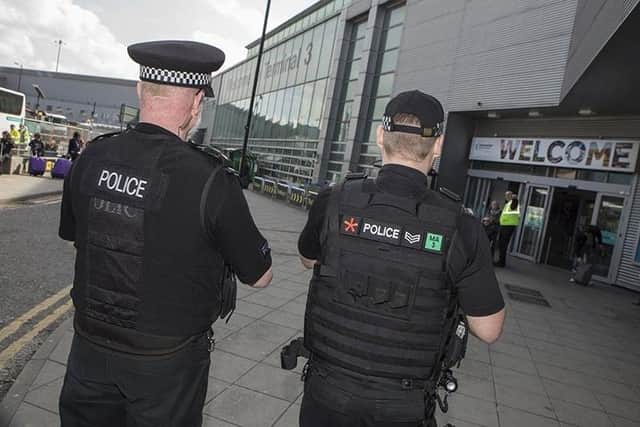The 26-year-old was arrested at Manchester Airport  just minutes before jetting off for 10 days in the sun on an Easy Jet flight to Greece